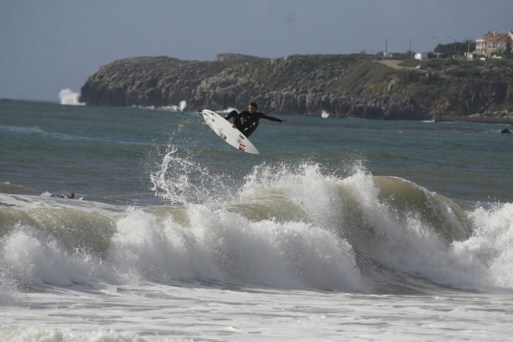 Surfing beaches - Peniche with surfing guy